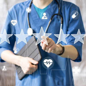 Michigan doctor selecting a rating out of five stars as on a survey.