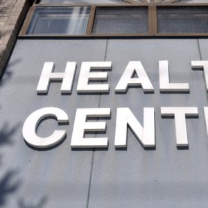 A FQHC building with "Health Center" written on it.