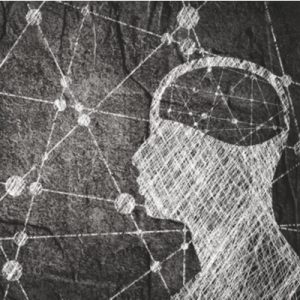 A black and white chalk-style drawing of a profile. The individual represents a person in prison and a node network in their brain represents behavioral health needs.