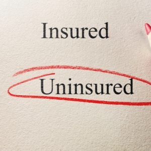 The words "insured" and "uninsured", with "uninsured" circled in red.