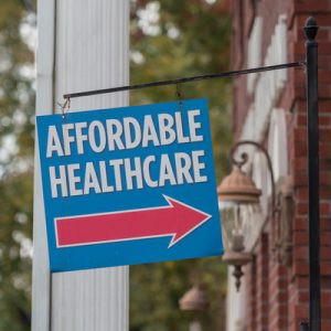 Sign reading "Affordable Healthcare", referring to the Health Insurance Marketplace