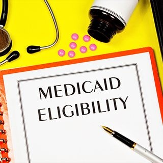 Notebook cover that reads Medicaid Eligibility