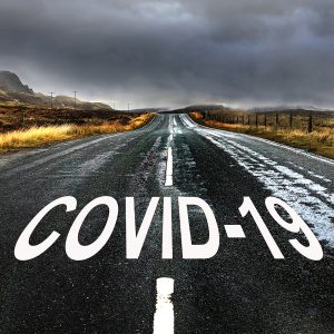 Road with COVID 19 written on it.