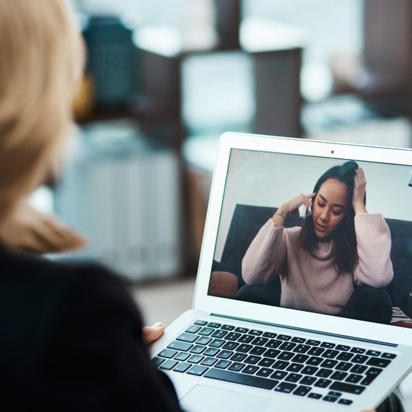 A mental health provider offers therapy via Telehealth