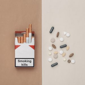 Tobacco cigarettes and opioid pills