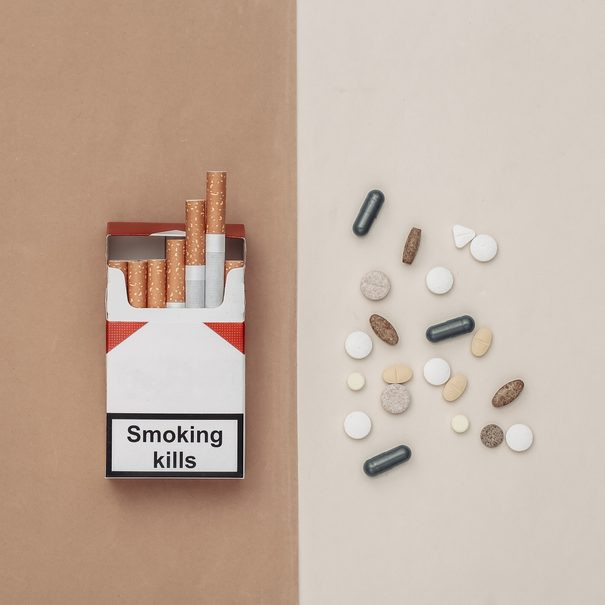 Tobacco cigarettes and opioid pills