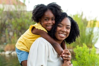 Black mother with her young child