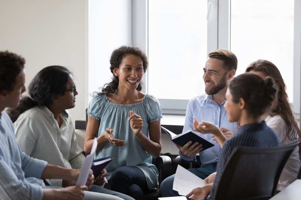 Fellows in a circle learning from each other