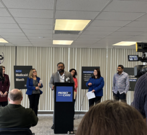 Joshua Traylor, CHRT executive director, speaks at a press conference to protect Medicaid.